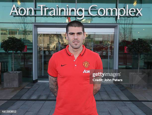 Victor Valdes of Manchester United poses after signing for the club at Aon Training Complex on January 8, 2015 in Manchester, England.