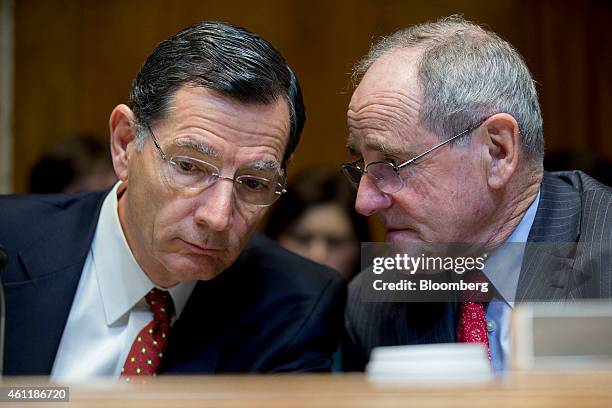 Senator Jim Risch, a Republican from Idaho, right, talks to Senator John Barrasso, a Republican from Wyoming, during a Senate Energy and Natural...