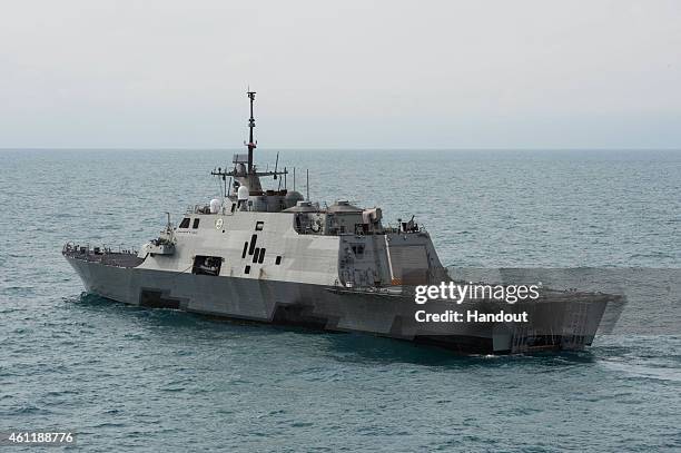 The littoral combat ship USS Fort Worth operates on January 7, 2015 in the Java Sea. The U.S. Navy is supporting the Indonesian-led AirAsia flight...