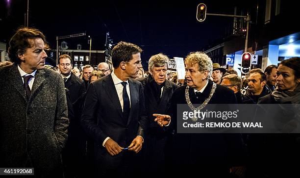 Dutch Foreign Minister Bert Koenders, Prime Minister Mark Rutte, Minister of Safety and Justice Ivo Opstelten and Mayor of Amsterdam Eberhard van der...