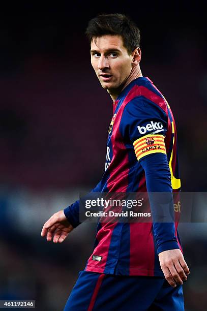 Lionel Messi of FC Barcelona looks on during the Copa del Rey Round of 16 First Leg match between FC Barcelona and Elche CF at Camp Nou on January 8,...