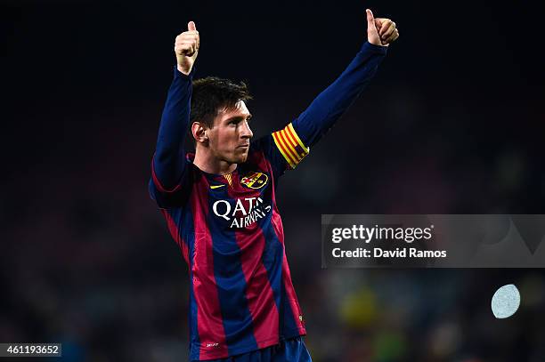 Lionel Messi of FC Barcelona celebrates after scoring his team's third goal during the Copa del Rey Round of 16 First Leg match between FC Barcelona...