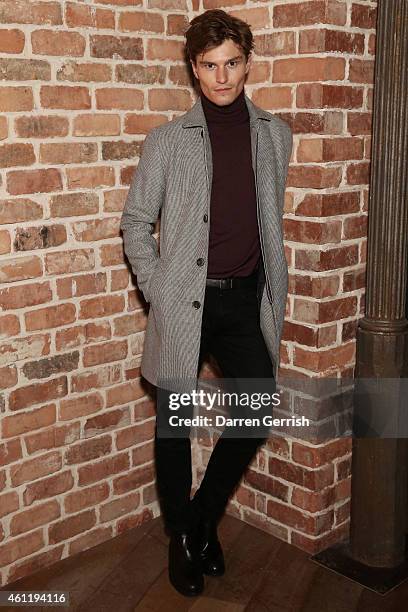 Oliver Cheshire attends the Superdry & British Fashion Council official launch event for the London Collections: Men AW15 at Superdry on January 8,...