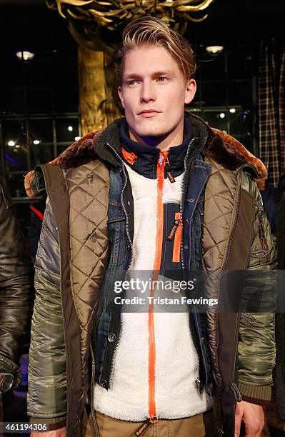 Model presenting the AW15 collection at the Superdry and British Fashion Council London Collections: Men Official Launch Event at Superdry on January...