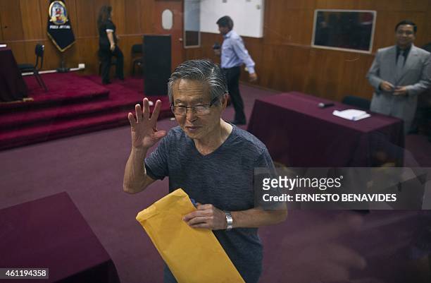 Peru's former President Alberto Fujimori, arrives for the reading of the verdict on charges of embezzling state funds and using them to manipulate...