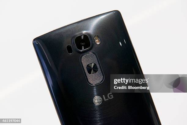 Electronics Inc. G Flex curved smartphone is displayed for a photograph at the 2015 Consumer Electronics Show in Las Vegas, Nevada, U.S., on...