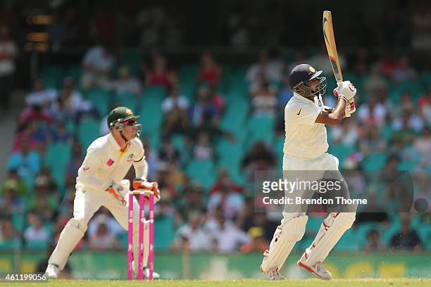 Ravichandran Ashwin of India hits for six during day four of the Fourth Test match between Australia and India at Sydney Cricket Ground on January 9,...
