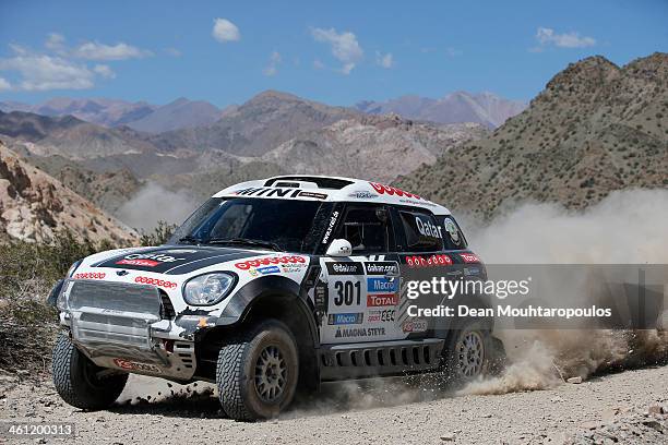 Nasser Al-Attiyah of Qatar and Lucas Cruz of Spain for MINI compete on Day 3 of the Dakar Rally 2014 on January 7, 2014 in Uspallata, Argentina.