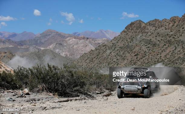Nasser Al-Attiyah of Qatar and Lucas Cruz of Spain for MINI compete on Day 3 of the Dakar Rally 2014 on January 7, 2014 in Uspallata, Argentina.