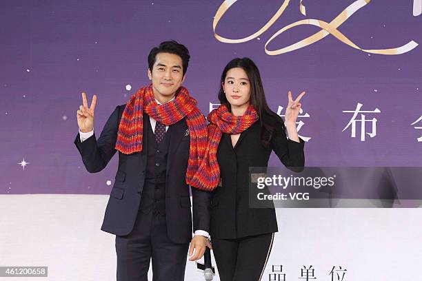 Actor Song Seung Heon and actress Liu Yifei attend director John H. Lee's film "The Third Love" press conference on January 8, 2015 in Beijing, China.
