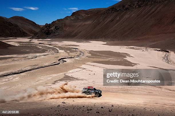 Nani Roma of Spain and Michel Perin of France driving for the ALL4 Racing Mini Monster Energy Rally Raid Team compete during day 5 of the Dakar...
