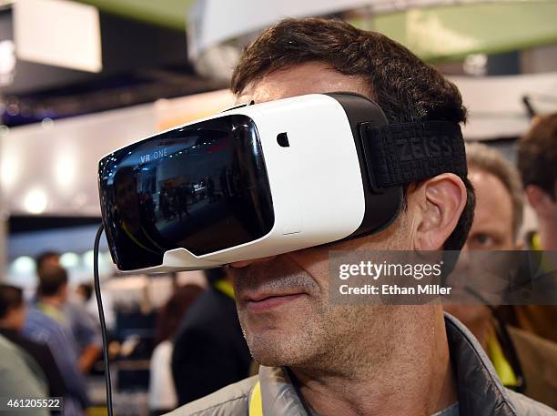 Juan Cobian Fernandez of Spain tries the VR One as part of the Parrot Bebop Drone Skycontroller at the 2015 International CES at the Las Vegas...