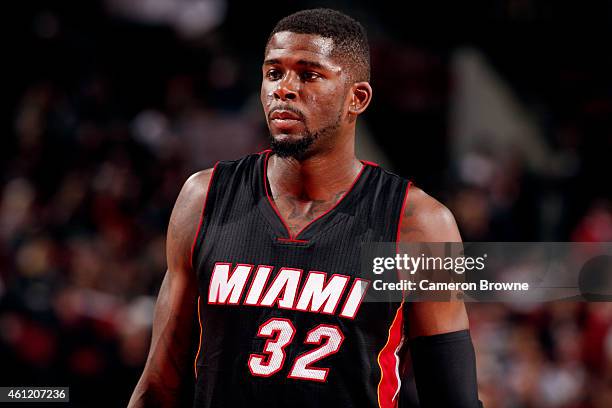 James Ennis of the Miami Heat stands on the court during a game against the Portland Trail Blazers on January 8, 2015 at the Moda Center Arena in...