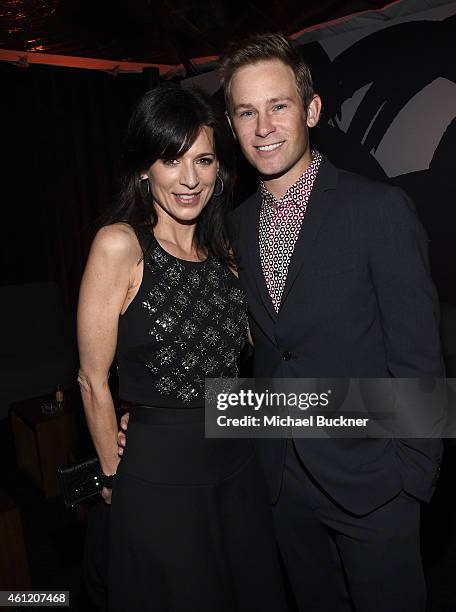 Actress Perrey Reeves and Grips co-founder and president sAaron Fox attend Audi celebrates Golden Globes Week 2015 at Cecconi's Restaurant on January...