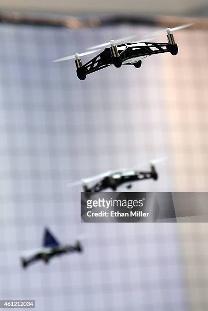 Parrot MiniDrones fly at the 2015 International CES at the Las Vegas Convention Center on January 8, 2015 in Las Vegas, Nevada. CES, the world's...