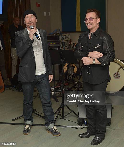 The Edge and Bono speak at The Weinstein Company Hosts A Private Party With U2 In Support Of Their Original Song "Ordinary Love" From "MANDELA: LONG...