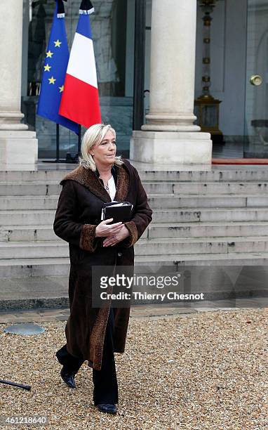 French far-right National Front leader Marine Le Pen leaves the Elysee Palace after a meeting with French President, Francois Hollande on January 9,...