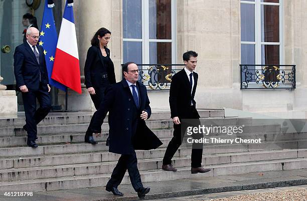 French President Francois Hollande leaves the presidential Elysee palace to hold a crisis meeting with French prefects at the Interior Ministry on...