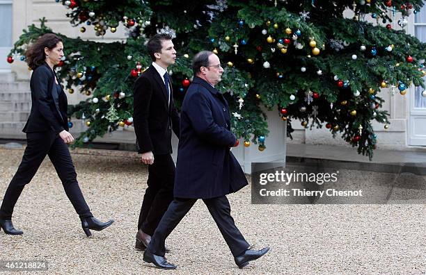 French President Francois Hollande leaves the presidential Elysee palace to hold a crisis meeting with French prefects at the Interior Ministry on...