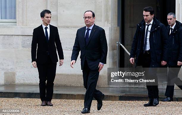 French President Francois Hollande returns to the presidential Elysee palace after holding a crisis meeting with French prefects at the Interior...