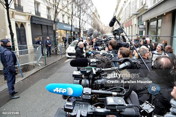 The press attends a meeting held with the remaining editorial staff of Charlie Hebdo at the Liberation offices on January 9, 2015 in Paris, France....