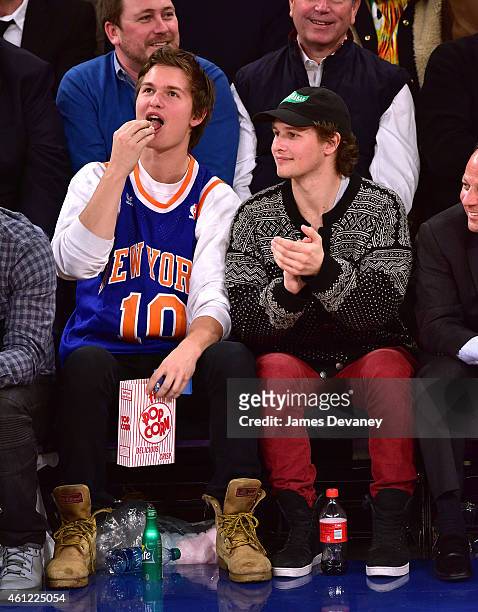Ansel Elgort and guest attend the Houston Rockets vs New York Knicks game at Madison Square Garden on January 8, 2015 in New York City.