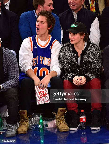 Ansel Elgort and guest attend the Houston Rockets vs New York Knicks game at Madison Square Garden on January 8, 2015 in New York City.