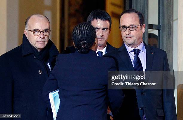 French president Francois Hollande says goodbye to French Justice minister Christiane Taubira , French Interior minister Bernard Cazeneuve and French...