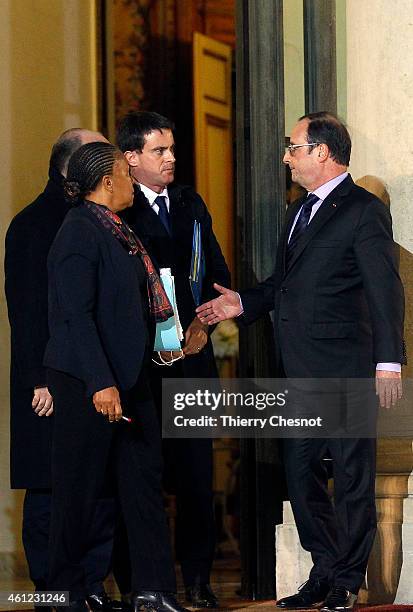 French president Francois Hollande says goodbye to French Justice minister Christiane Taubira , French Interior minister Bernard Cazeneuve and French...