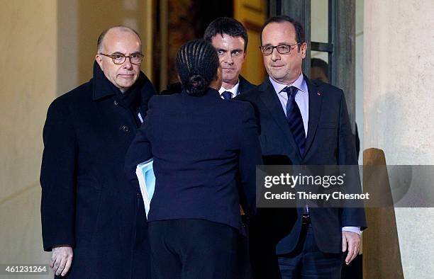 French president Francois Hollande says goodbye to French Justice minister Christiane Taubira , French Interior minister Bernard Cazeneuve and French...