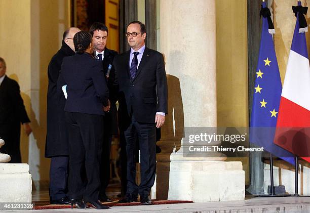 French president Francois Hollande says goodbye to French Justice minister Christiane Taubira , French Interior minister Bernard Cazeneuve and French...