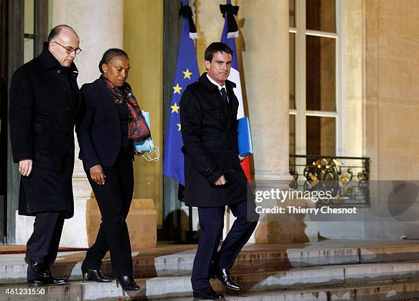 French Prime Minister Manuel Valls , French Justice Minister Christiane Taubira and French Interior Minister Bernard Cazeneuve leave the Elysee...