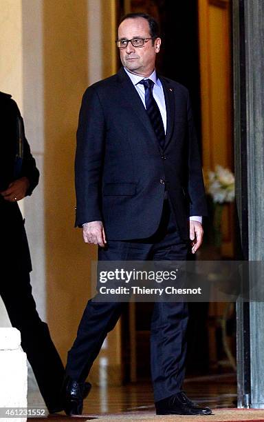 French President Francois Hollande leaves after holding a crisis meeting at the Elysee Palace on January 9 in Paris, France. Both sieges in France...