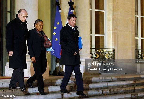 French Prime Minister Manuel Valls , French Justice Minister Christiane Taubira and French Interior Minister Bernard Cazeneuve leave the Elysee...