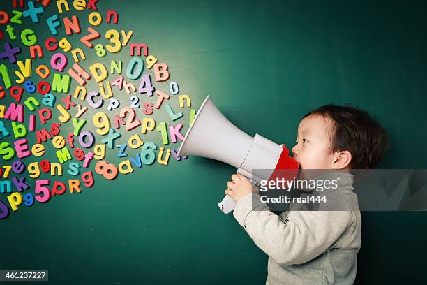 cute asia children - multi coloured megaphone stock pictures, royalty-free photos & images