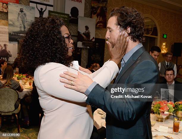 Actors Oprah Winfrey and Matthew McConaughey attend the 15th Annual AFI Awards Luncheon at Four Seasons Hotel Los Angeles at Beverly Hills on January...
