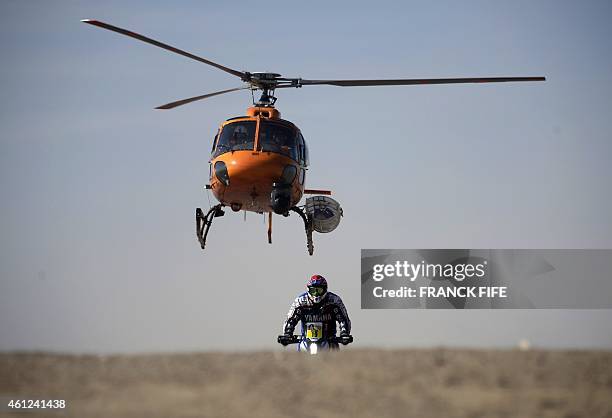 Yamaha's Italian biker Alessandro Botturi rides during the 2015 Dakar Rally stage 6 between Antofogasta and Iquique, Chile, on January 9, 2015. AFP...