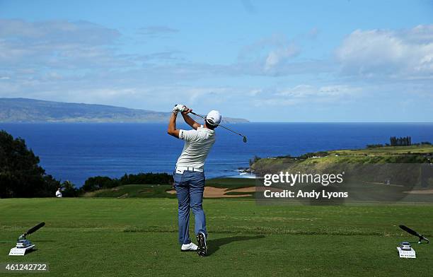 Sang-Moon Bae of South Korea plays his shot from the 11th tee during round one of the Hyundai Tournament of Champions at Plantation Course at Kapalua...