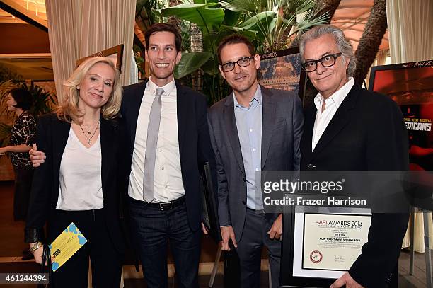 Producers Betsy Beers, Pete Nowalk, Scott Collins and director Bill D'Elia pose with award during the 15th Annual AFI Awards at Four Seasons Hotel...