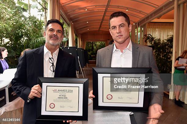 Writer Peter Morgan and actor Jason Hall pose with awards during the 15th Annual AFI Awards at Four Seasons Hotel Los Angeles at Beverly Hills on...