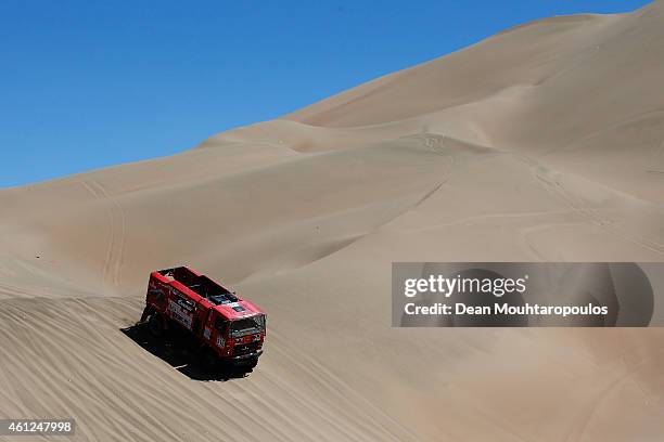 Siarhei Viazovich, Pavel Haranin and Andrei Zhyhulin of Belaraus for Maz Sportauto compete during day 6 of the Dakar Rallly between Antofaasta and...