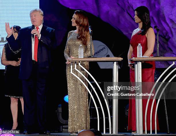 Donald Trump,Barbara Palacios and Roxanne Vargas attends Miss Universe Welcome Event and Reception at Downtown Doral Park on January 9, 2015 in...