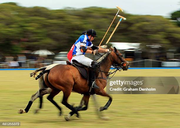 Polo players compete during the Portsea Polo event at Point Nepean Quarantine Station on January 10, 2015 in Melbourne, Australia.