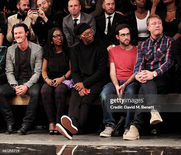 Luke Evans, Sofia Davis, Samuel L. Jackson, Beardyman and Adam Dewhurst sit in the front row during the Superdry AW14 catwalk event as part of London...