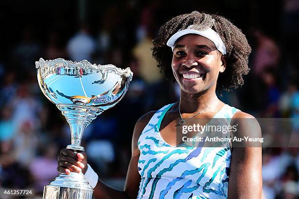Venus Williams of USA poses with the trophy after winning her singles final match against Caroline Wozniacki of Denmark during day six of the 2015...