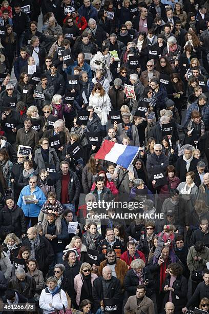 Tens of thousands of people some holding up signs that read, "Je suis Charlie" march during a rally along the sea front in the Mediterranean city of...