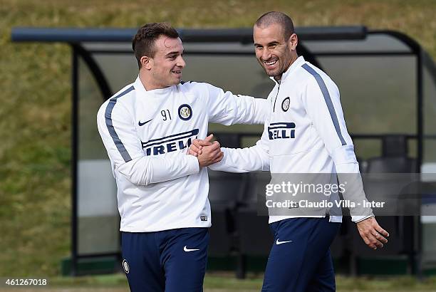 Rodrigo Palacio and Xherdan Shaqiri during the FC Internazionale Training Session at Appiano Gentile on January 10, 2015 in Como, Italy.