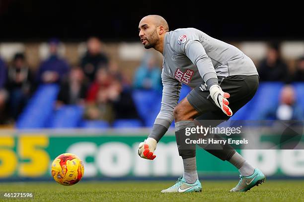 Derby County goalkeeper Lee Grant rolls the ball out to a teammate during the Sky Bet Championship match between Ipswich Town and Derby County at...