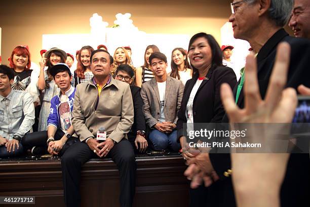 Prime Minister Prayut Chan-o-cha pose for photograph with youths during National Children's Day at The Government House in Bangkok. The National...