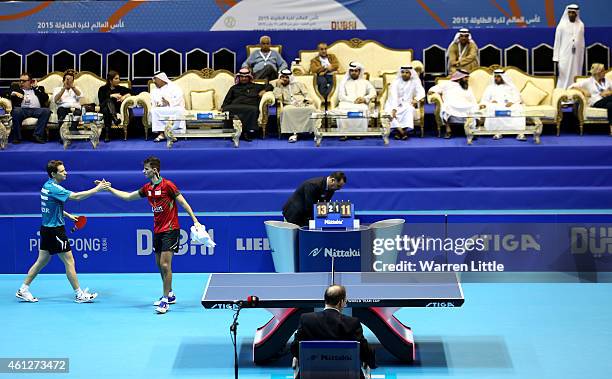 Robert Gardos of Austria is congratulated after winning the semi final match against Tiago Apolonia of Portugal during the 2015 IFFT World Team Cup...